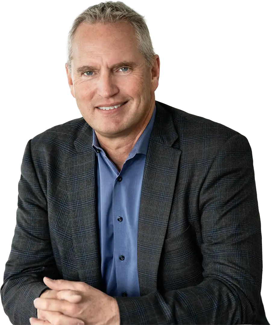 A cutout headshot portrait of Jotson Founder and CEO, and former Suncor President and CEO Mark Little for the 2025 AbaData User Conference